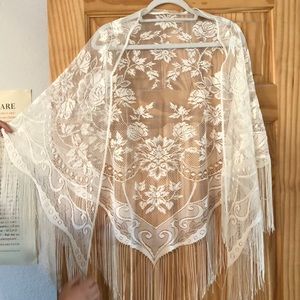 Beautiful lace shawl with delicate fringe